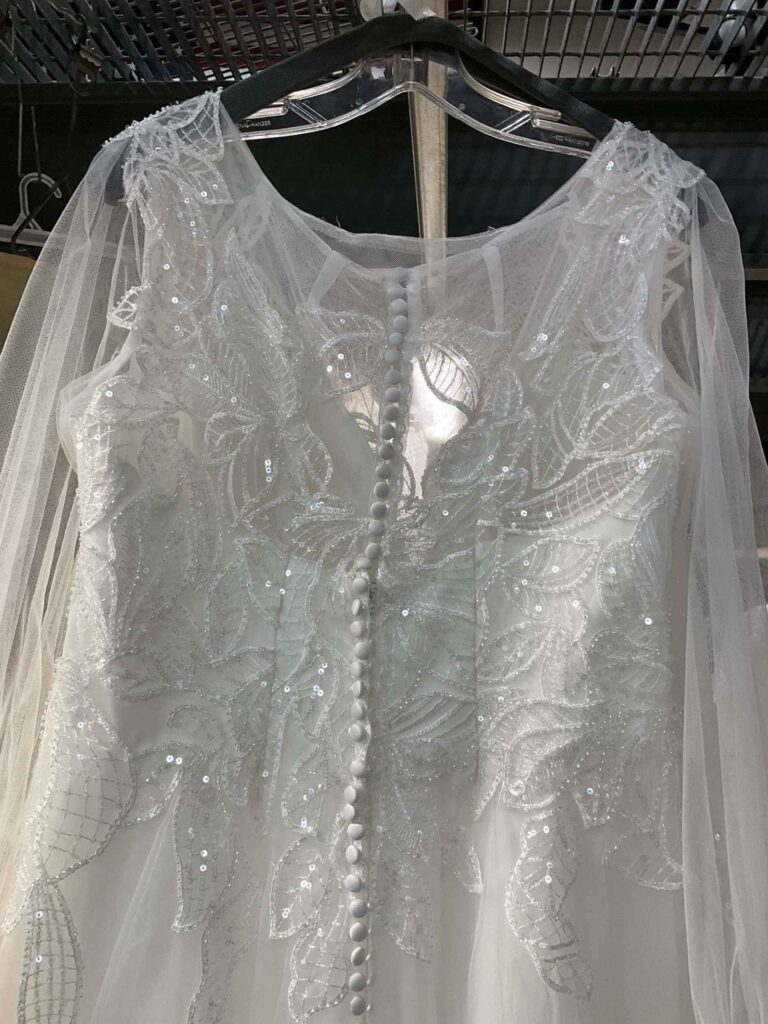 wedding dress with satin buttons in back